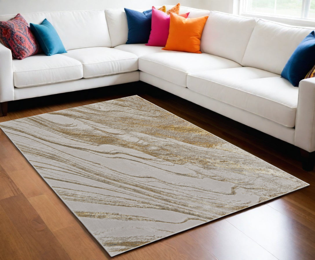 4' X 6' Ivory Brown and Gold Abstract Power Loom Area Rug