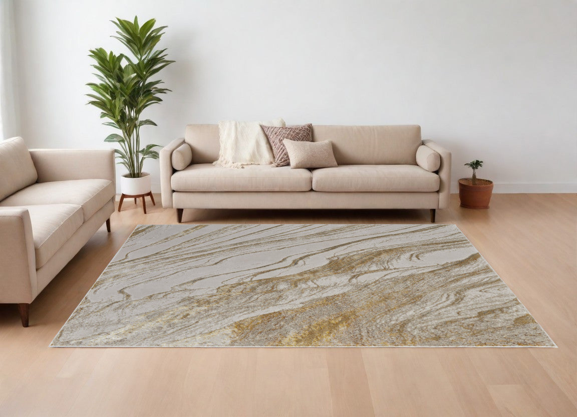 4' X 6' Ivory Brown and Gold Abstract Power Loom Area Rug