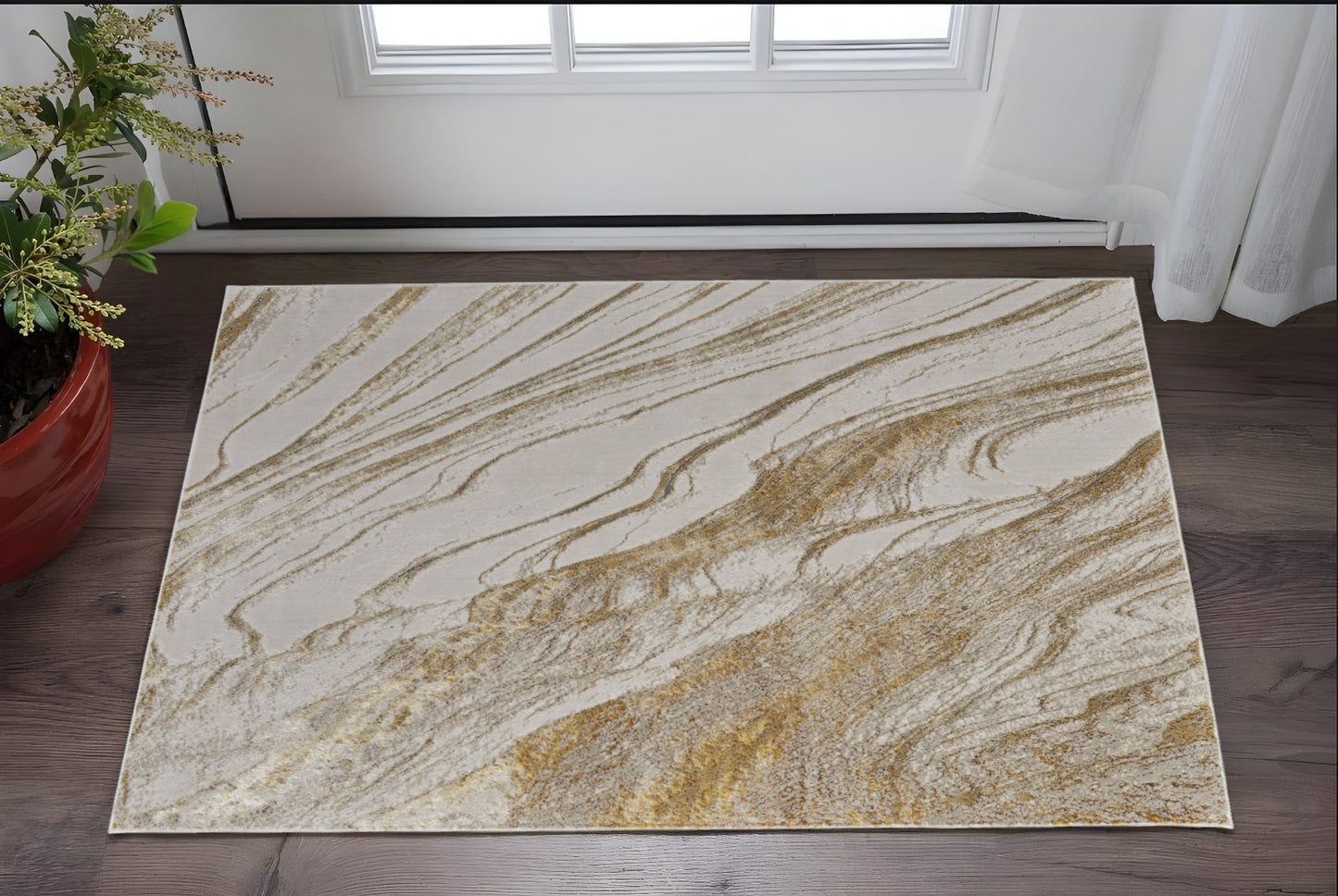 4' X 6' Ivory Brown and Gold Abstract Power Loom Area Rug